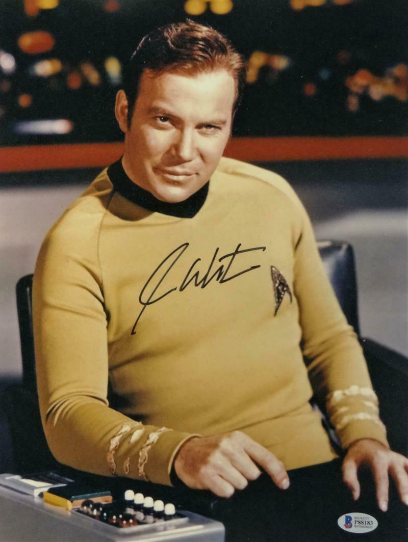 William Shatner Autographed 11x14 Star Trek Sitting Photo Poster painting - Beckett Auth *Black