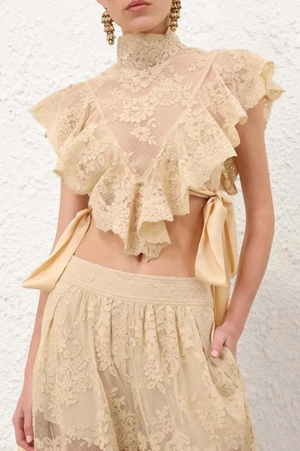 Salenia Lace Appliqu&eacute; High Neck Side Tie-up Ruffle Cropped Top