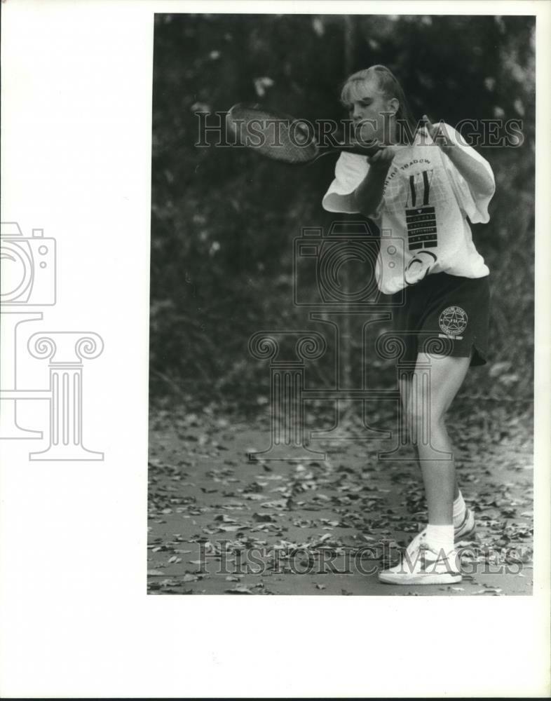 Press Photo Poster painting Tennis player Cortney Langford returns shot in match - tus03441