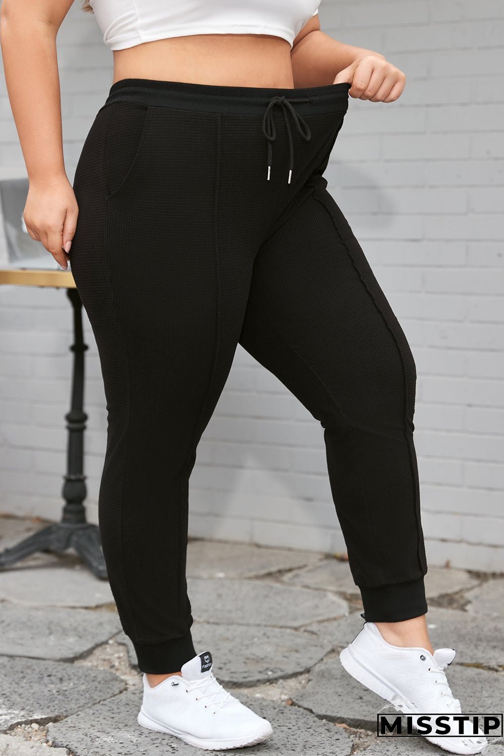 Black Plus Size Textured Exposed Seam Drawstring Jogger Pants