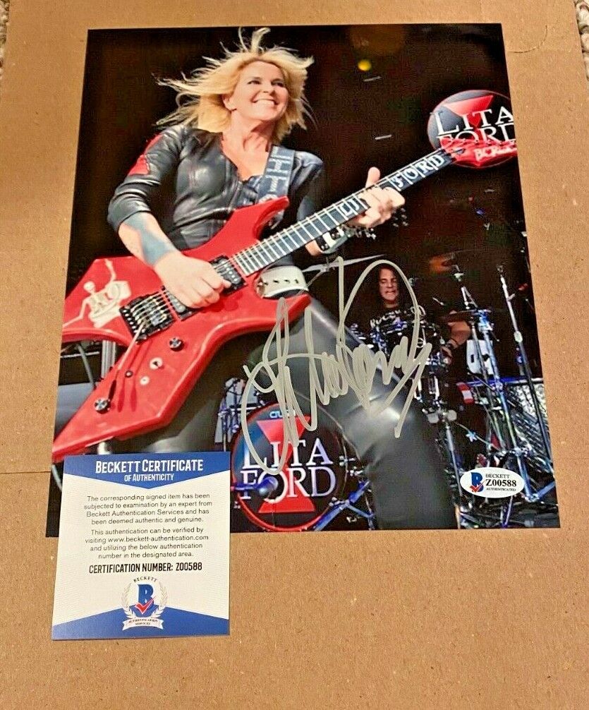 LITA FORD SIGNED ROCK AND ROLL MUSIC 8X10 Photo Poster painting BECKETT CERTIFIED