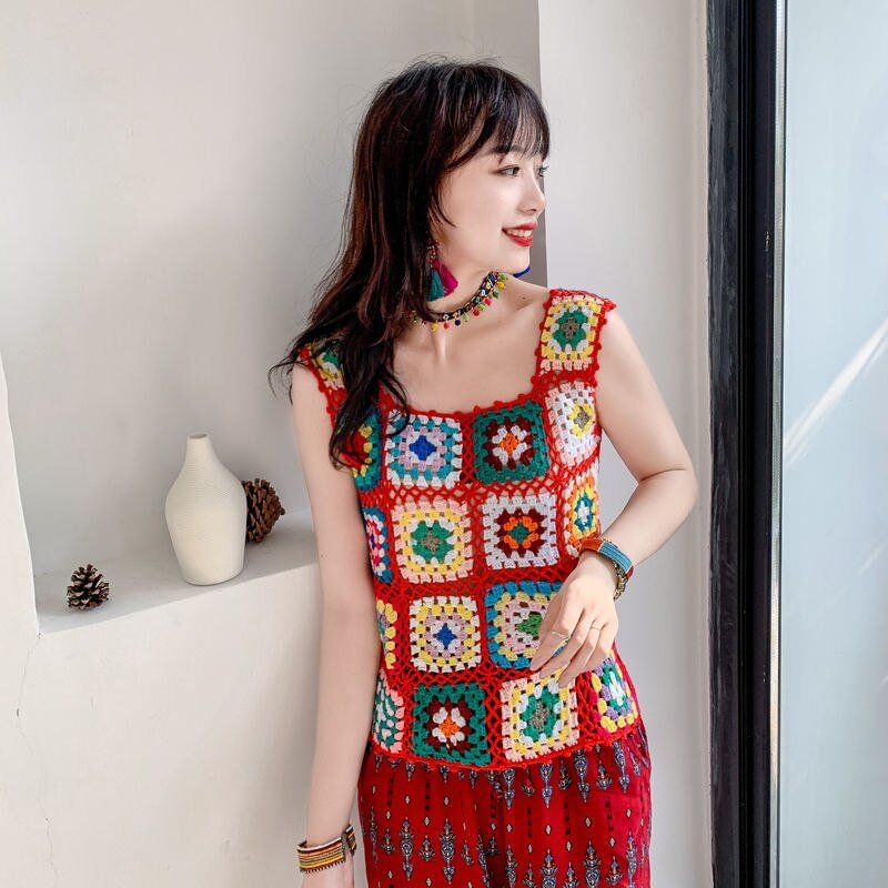 Retro knitted vest 2021 spring and summer fashion new women's crocheted hollow cropped top sling casual sweater
