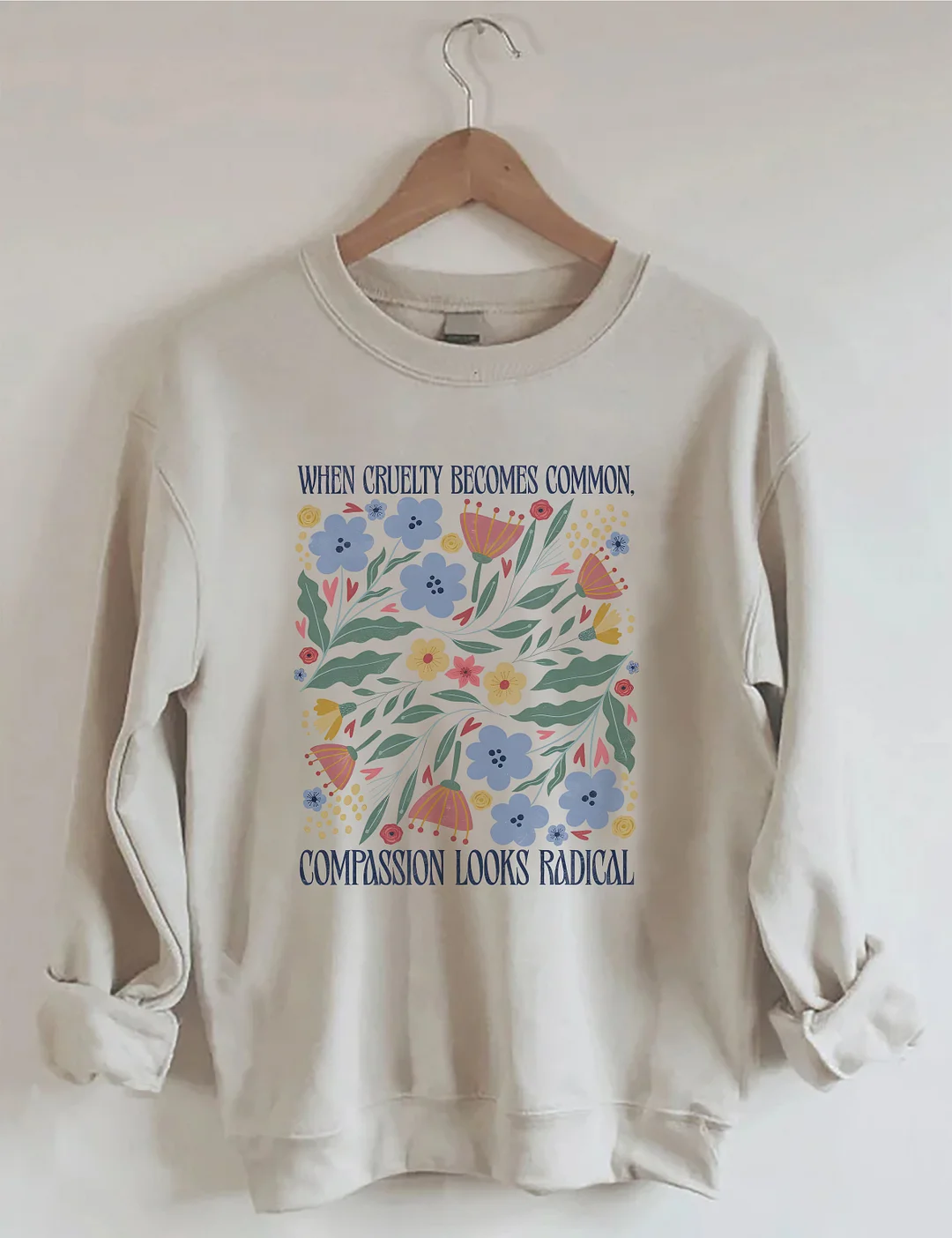 When Cruelty Becomes Common Compassion Looks Radical Sweatshirt