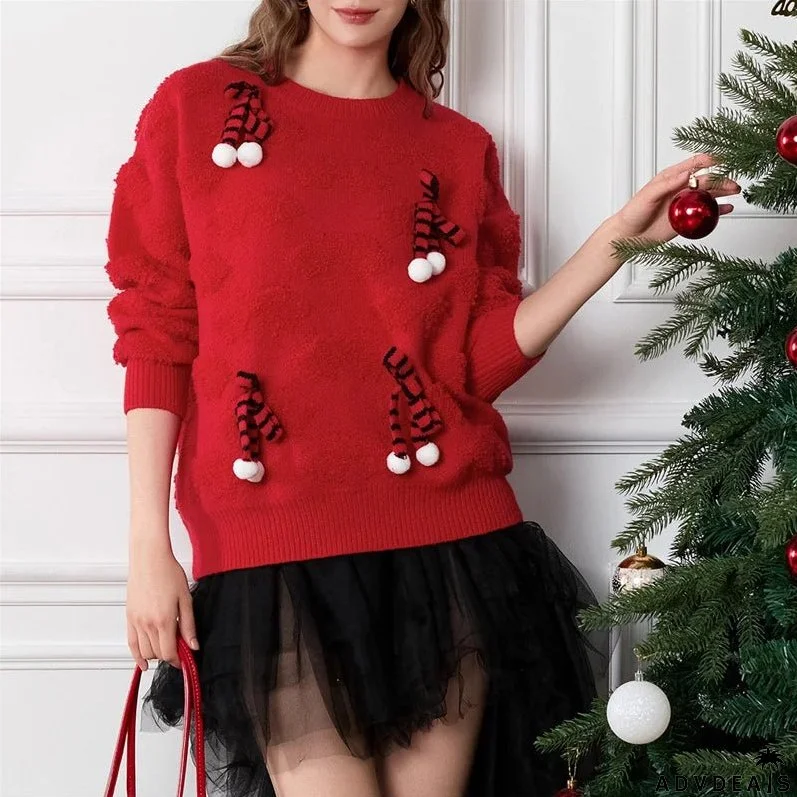 Warm women's knitted sweater with a crew neck and bow