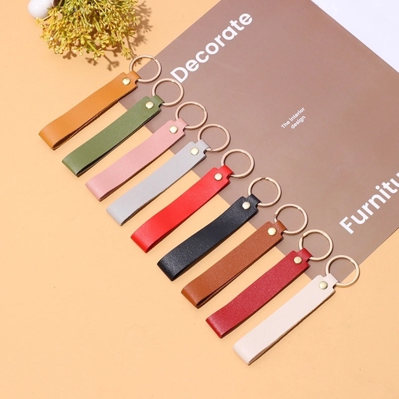 Solid Color Leather Key Chain Hand Rope Bag Pendant Doll Lanyard Fashion Couple Car Key Chain Accessories