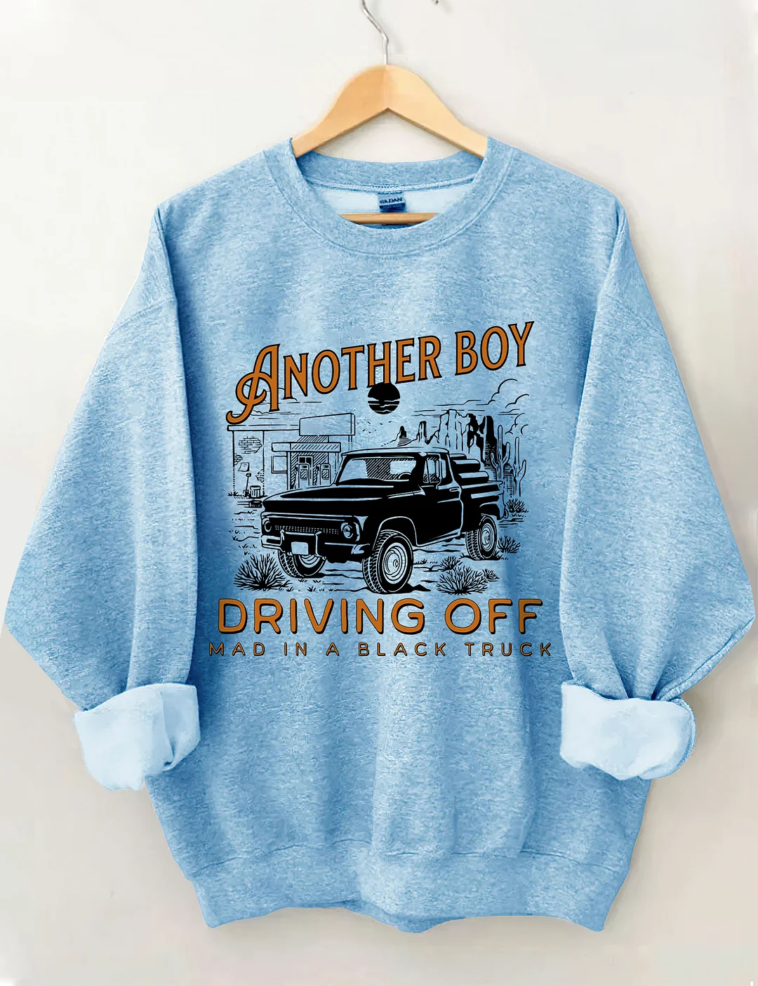 Boy Driving Off Mad Black Truck Sweatshirt