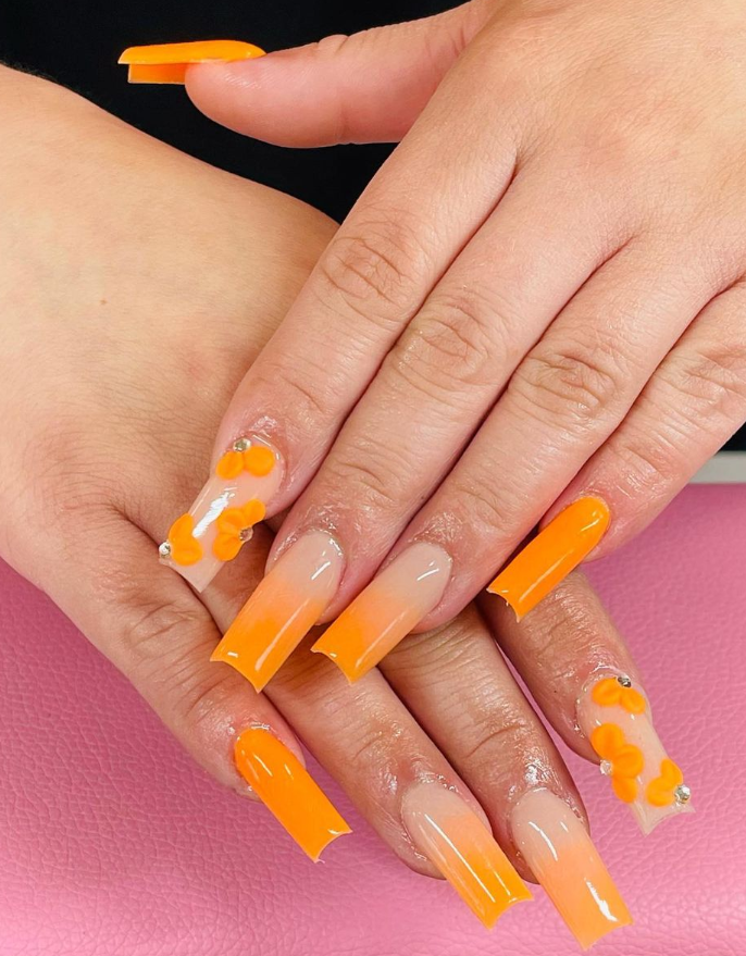 Orange acrylic nails