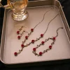 Ensemble de bijoux &eacute;l&eacute;gant avec collier et boucles d'oreilles en forme de fleur de rose