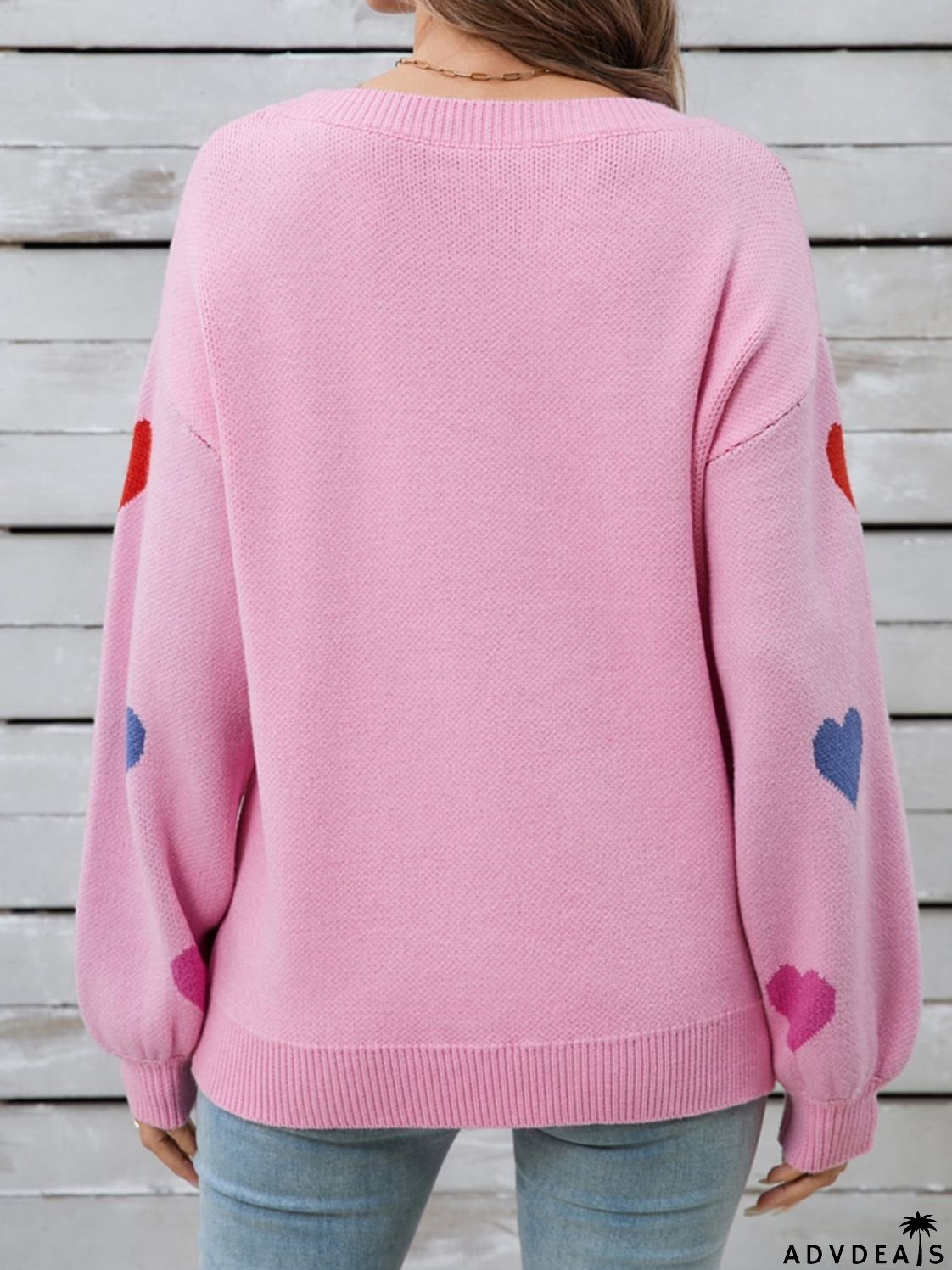 Heart-shaped, long-sleeved crew neck sweater