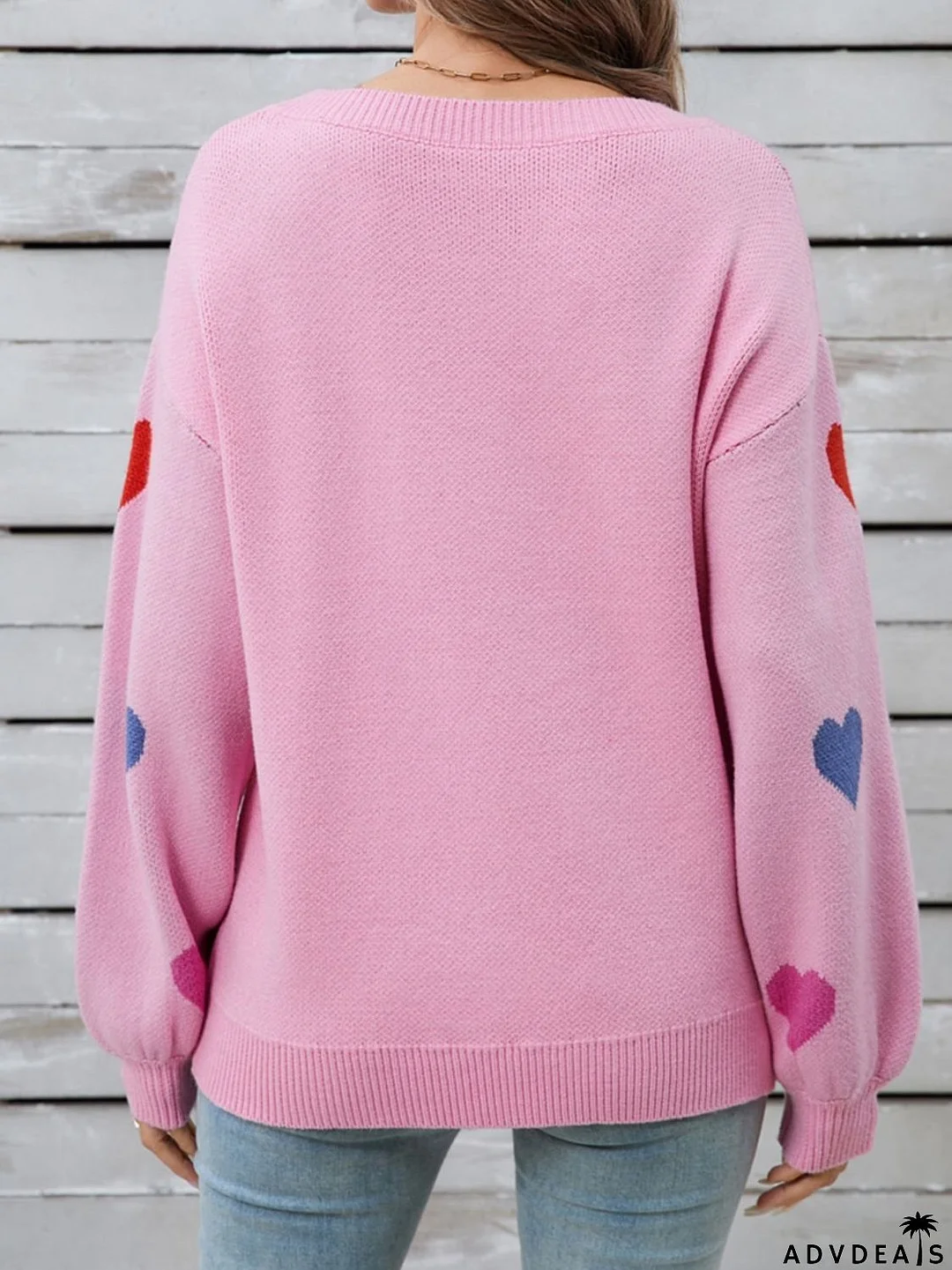 Heart-shaped, long-sleeved crew neck sweater
