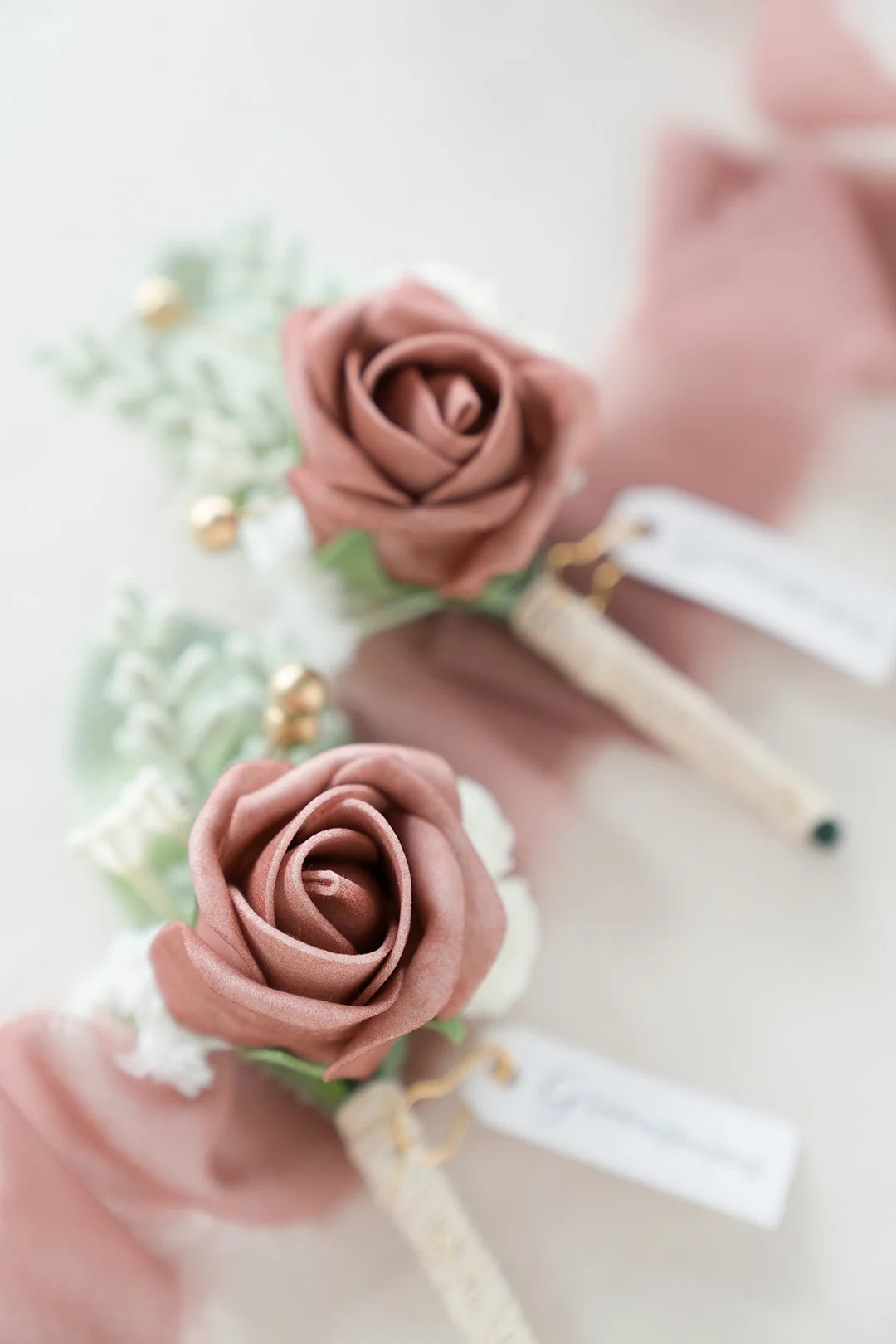 Boutonnieres in Dusty Rose & Cream
