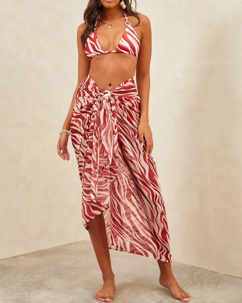 Three-piece swimsuit with irregular stripes print