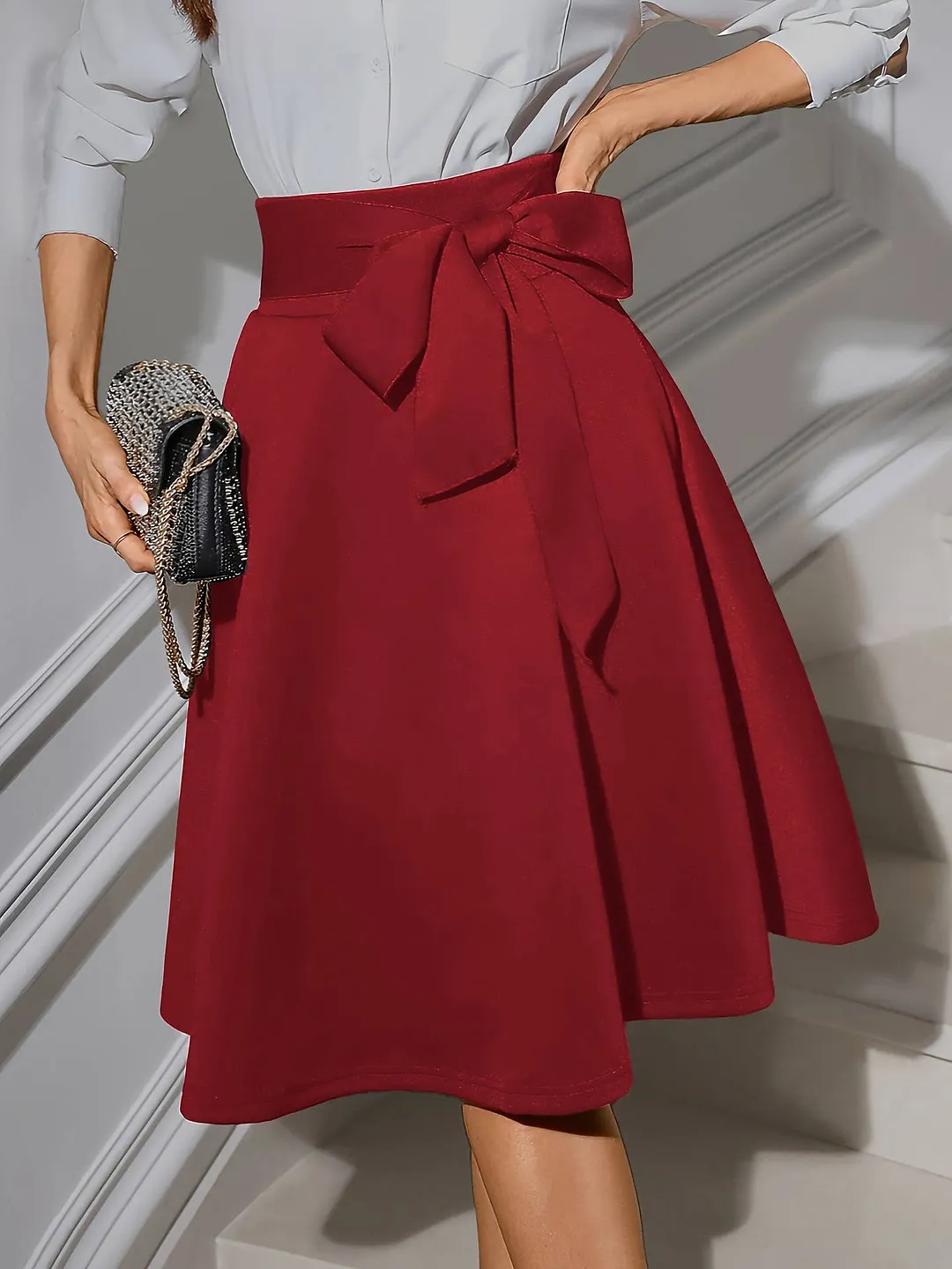 Stretch knit mid-length skirt with high waist