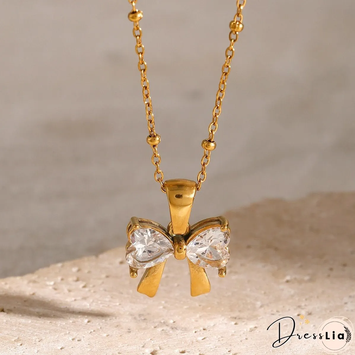 Stainless Steel Inlaid Zircon Bow Necklace