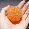 Hand-carved orange shape from pure natural jade - a collectible item