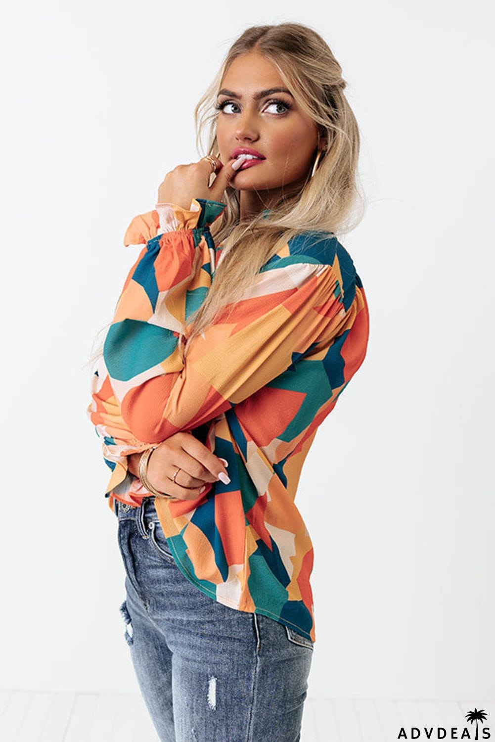 Geometric Patchwork Print Half Buttoned Blouse