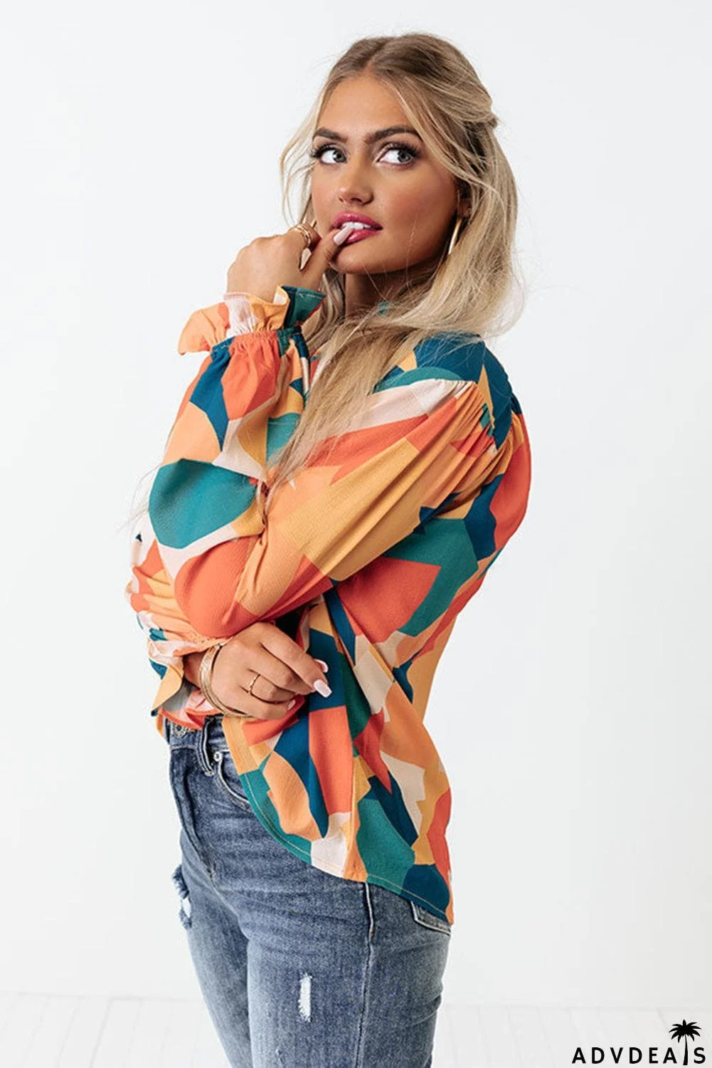 Geometric Patchwork Print Half Buttoned Blouse