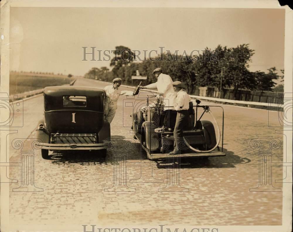 Press Photo Poster painting Indianapolis Speedway service car passes supplies to Roosevelt sedan