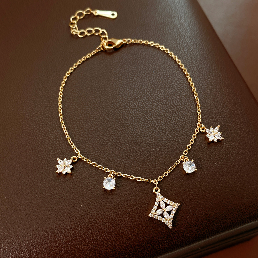 18k gold plated with zircon and star-shaped floral design this elegant and sophisticated bracelet is a versatile and stylish accessory