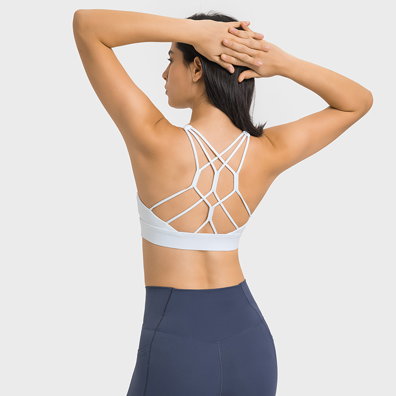 Buy Hergymclothing White disperse stress multi criss cross straps push-up high impact activewear workout bra with removable pads at an affordable price