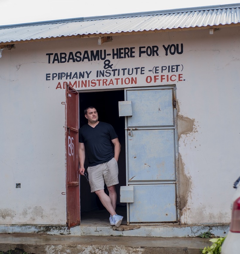 Kyle stands at the door of TABASAMU.