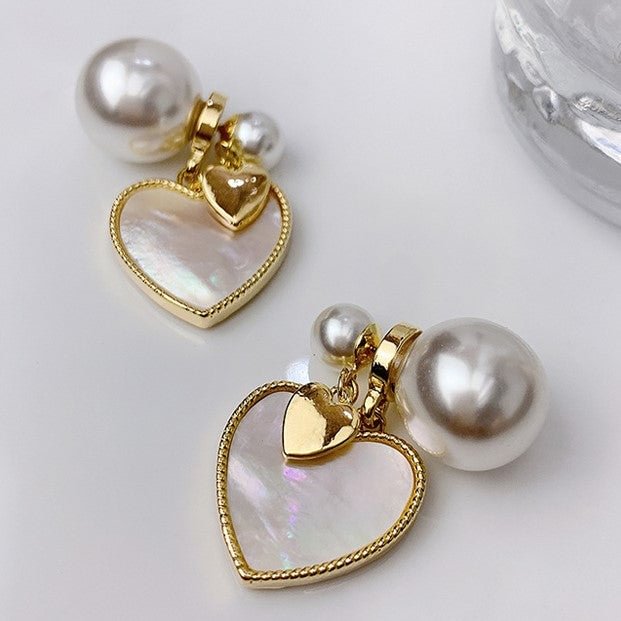 White mother-of-pearl earrings with love