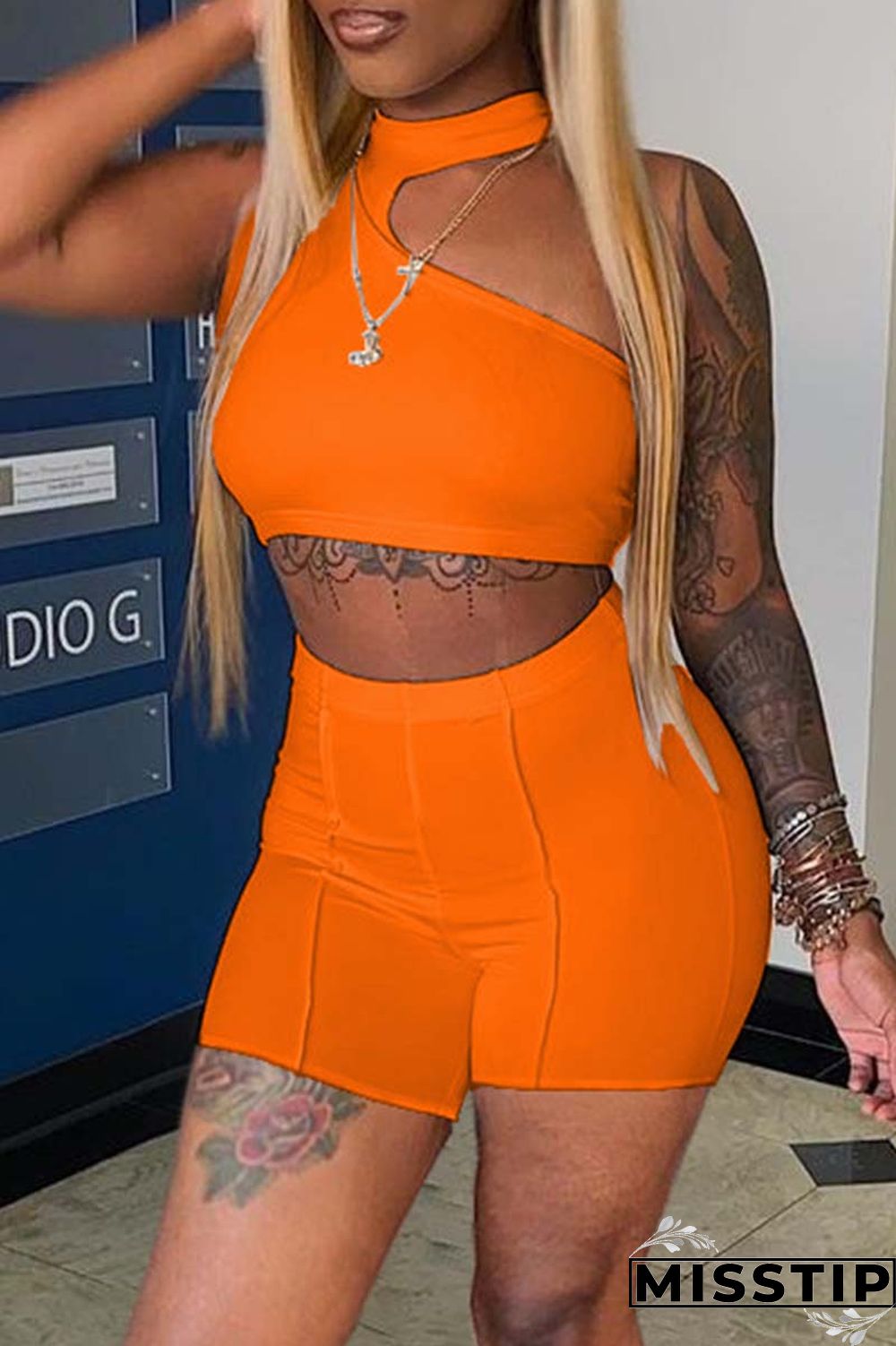 Orange Sexy Casual Solid Hollowed Out Half A Turtleneck Sleeveless Two Pieces