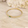 14K Yellow Gold Round Lab Diamond Bezel Setting Tennis Bracelet with A Baguette Cut Lab Emerald  Center Stone