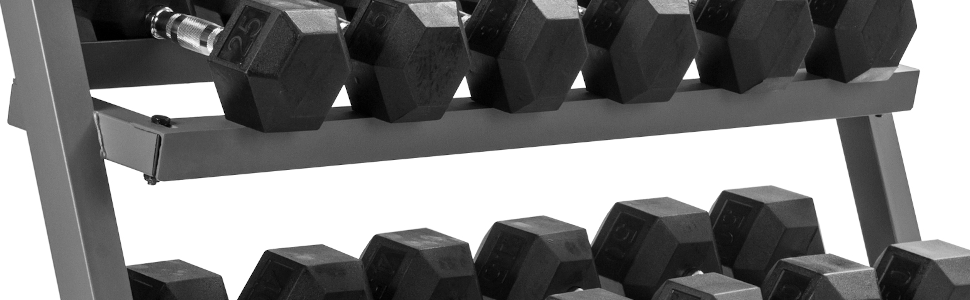 A zoomed-in view of the shelves of the XMark 3-Tier Dumbbell Rack loaded with dumbbells