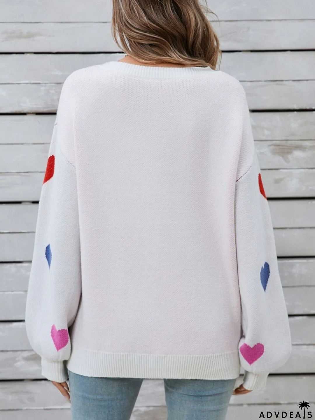 Heart-shaped, long-sleeved crew neck sweater