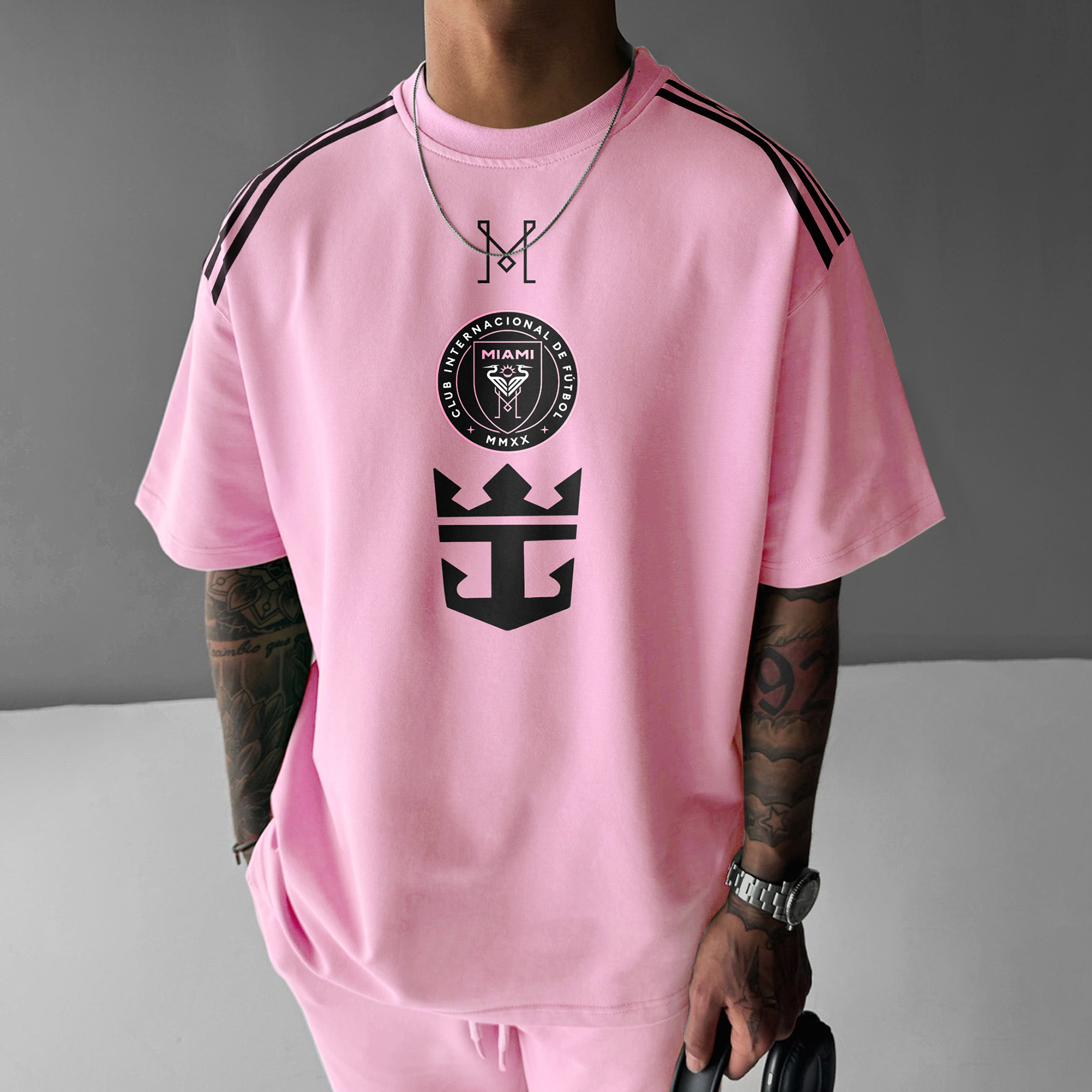  Stylish Pink T-Shirt with Bold Graphic Design for Men