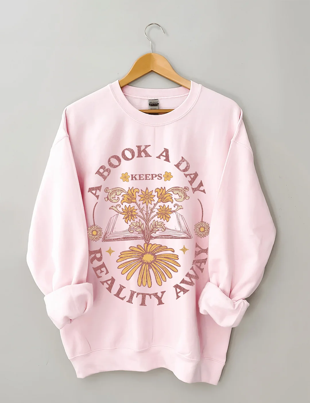 A Book A Day Keeps Reality Away Sweatshirt