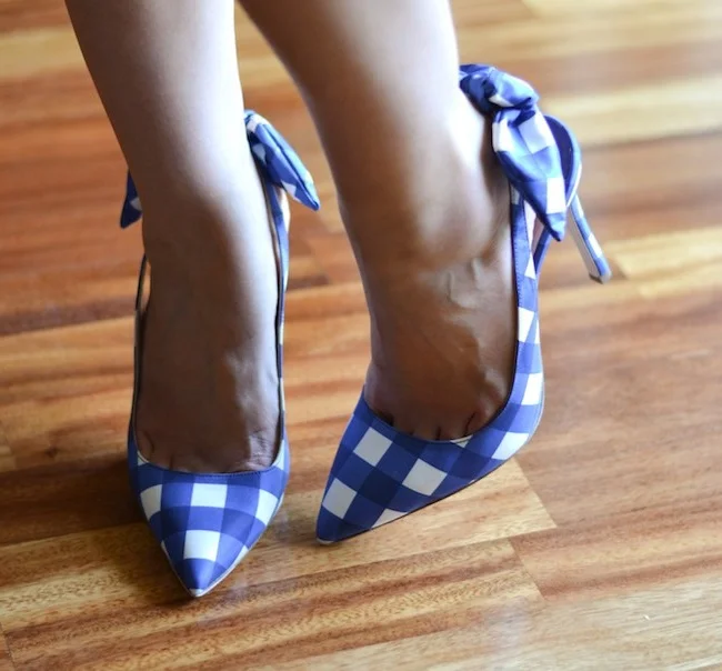 white heels with blue bow