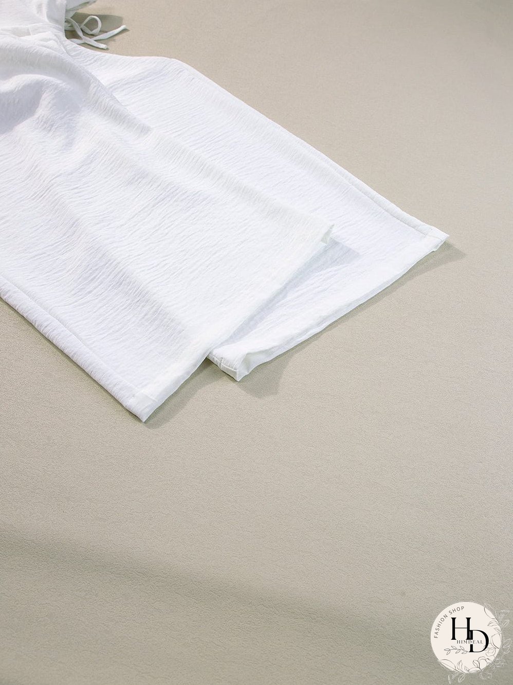 Elegant Beige Pleated Wide Leg Jumpsuit with Spaghetti Straps