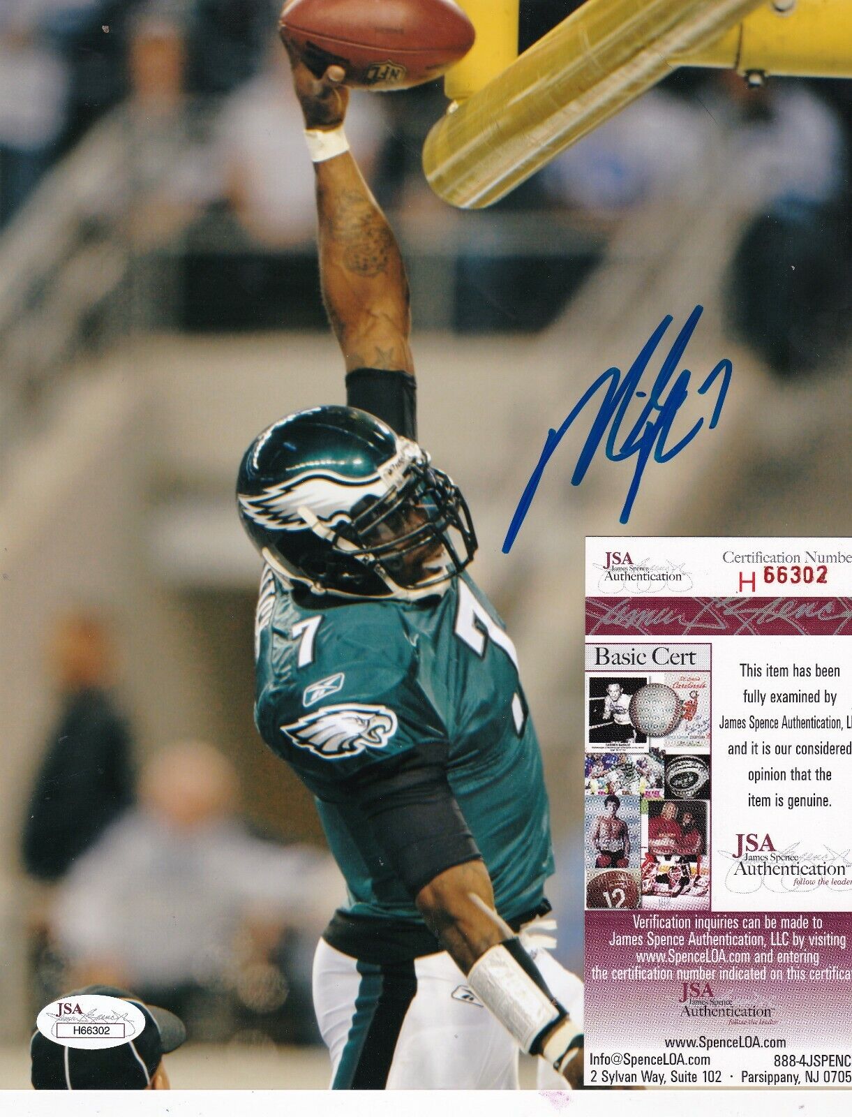 MICHAEL VICK PHILADELPHIA EAGLES JSA AUTHENTICATED ACTION SIGNED 8x10 Photo Poster painting