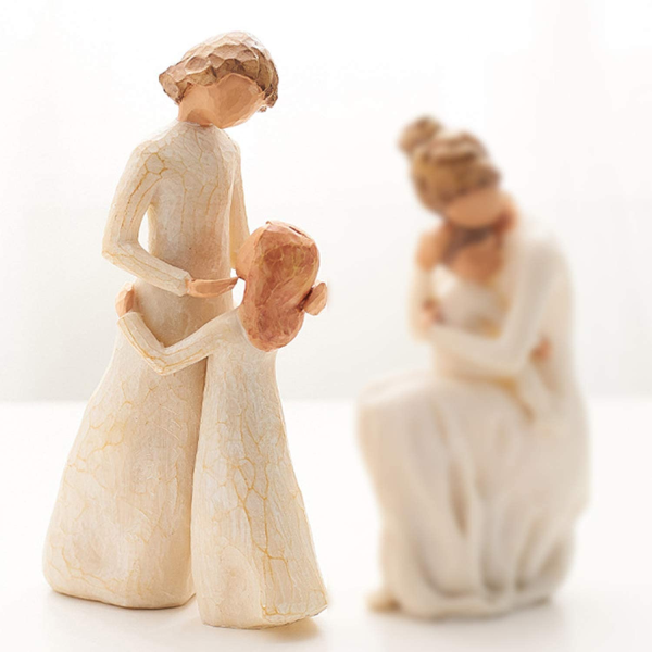 Hand-Painted Sculpture Of A Family Of Three
