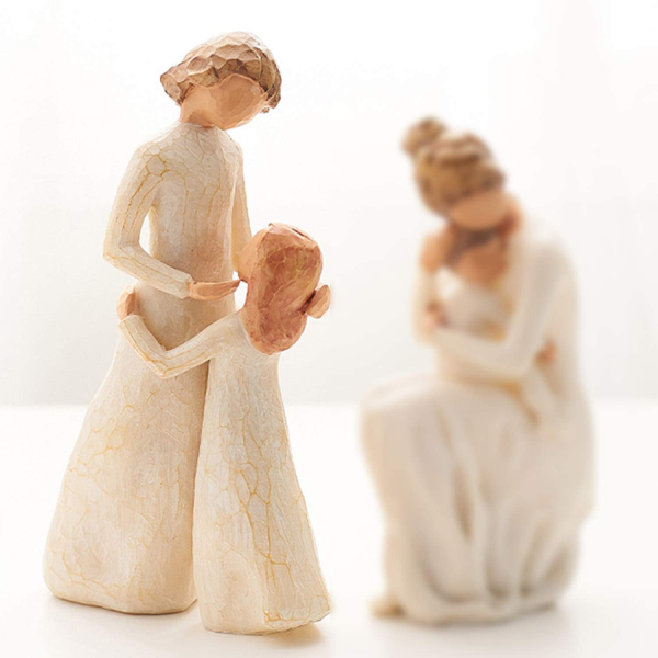 Hand-painted Sculpture Of A Family Of Three