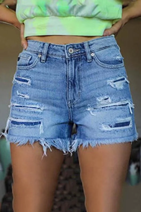 Sexy denim shorts with white rough edges and ripped holes