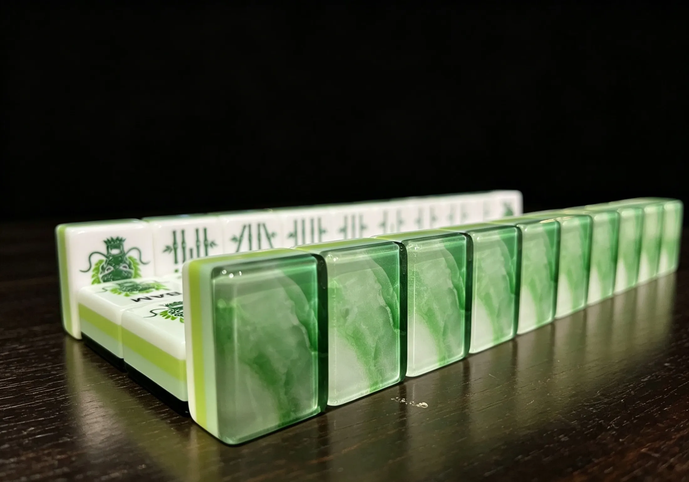 A low side view showing the translucent green backs and layered edge.