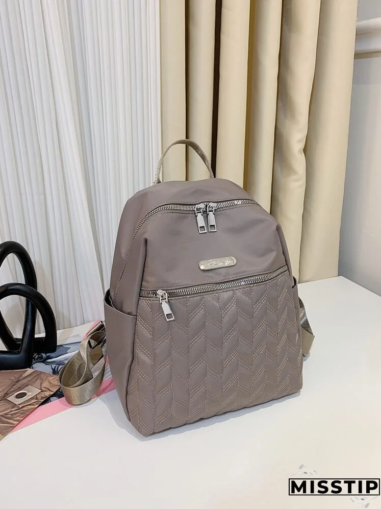 Metal Decor Quilted Backpack