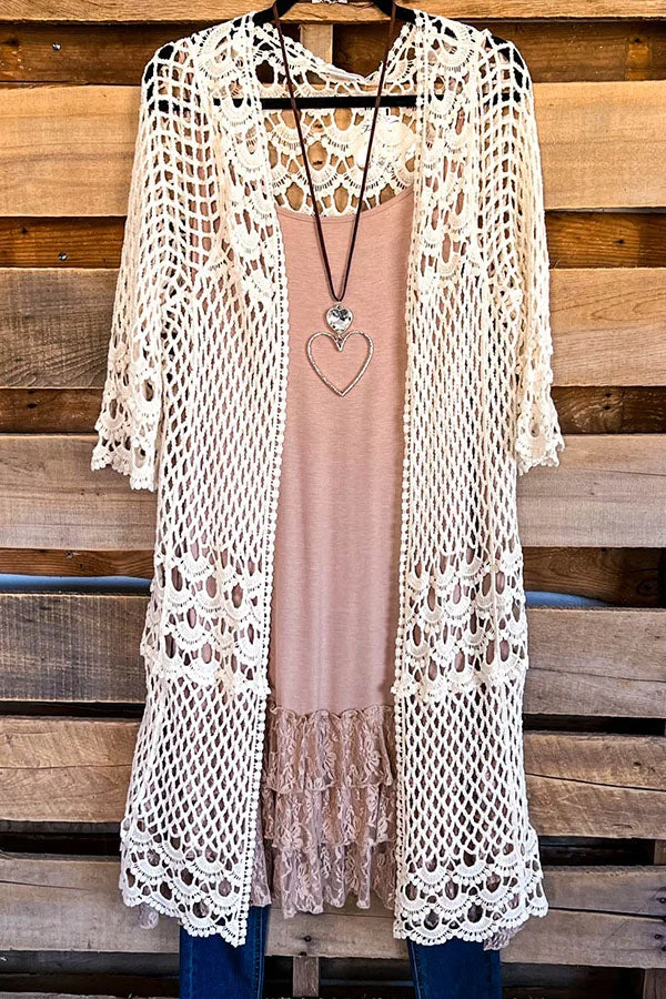 Beautiful patterned cardigan woven in 100% cotton