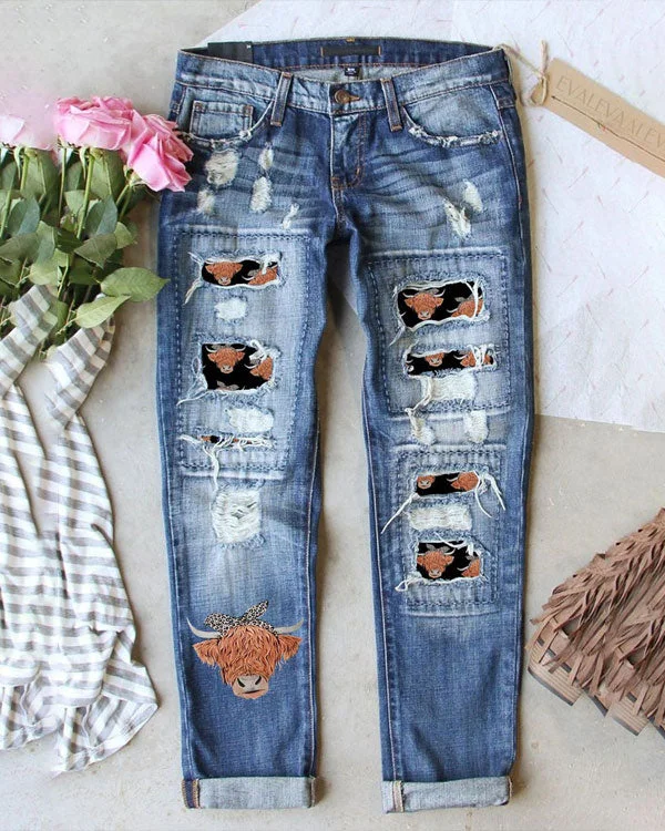 COW PATCHWORK RIPPED JEANS