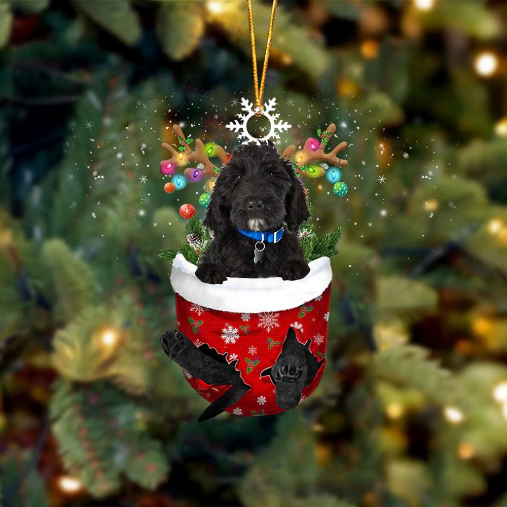 Black Labradoodle In Snow Pocket Christmas Ornament.