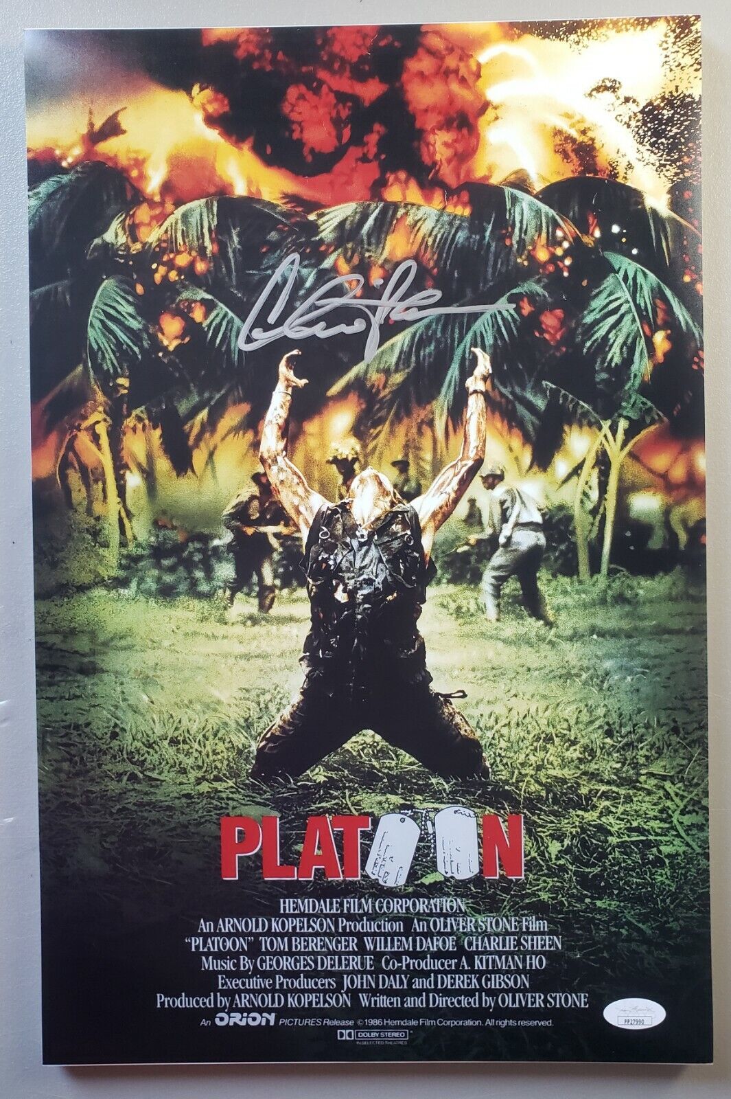 11x17 Autographed poster by Charlie Sheen in Platoon. JSA