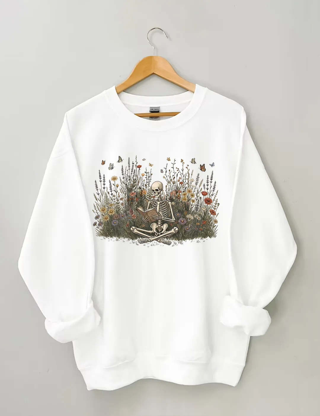 Skeleton Reading Book Sweatshirt