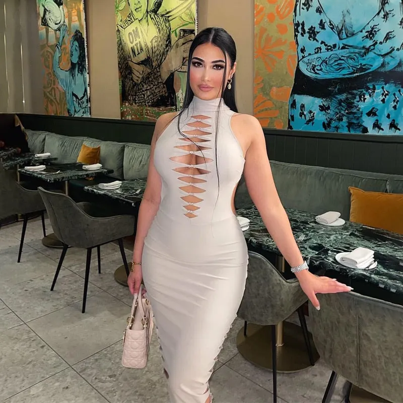 Hugcitar Solid Sleeveless Turtleneck Hollow Out Distressed Maxi Evening Dress 2021 Bodycon Party Elegant Streetwear Vestidos