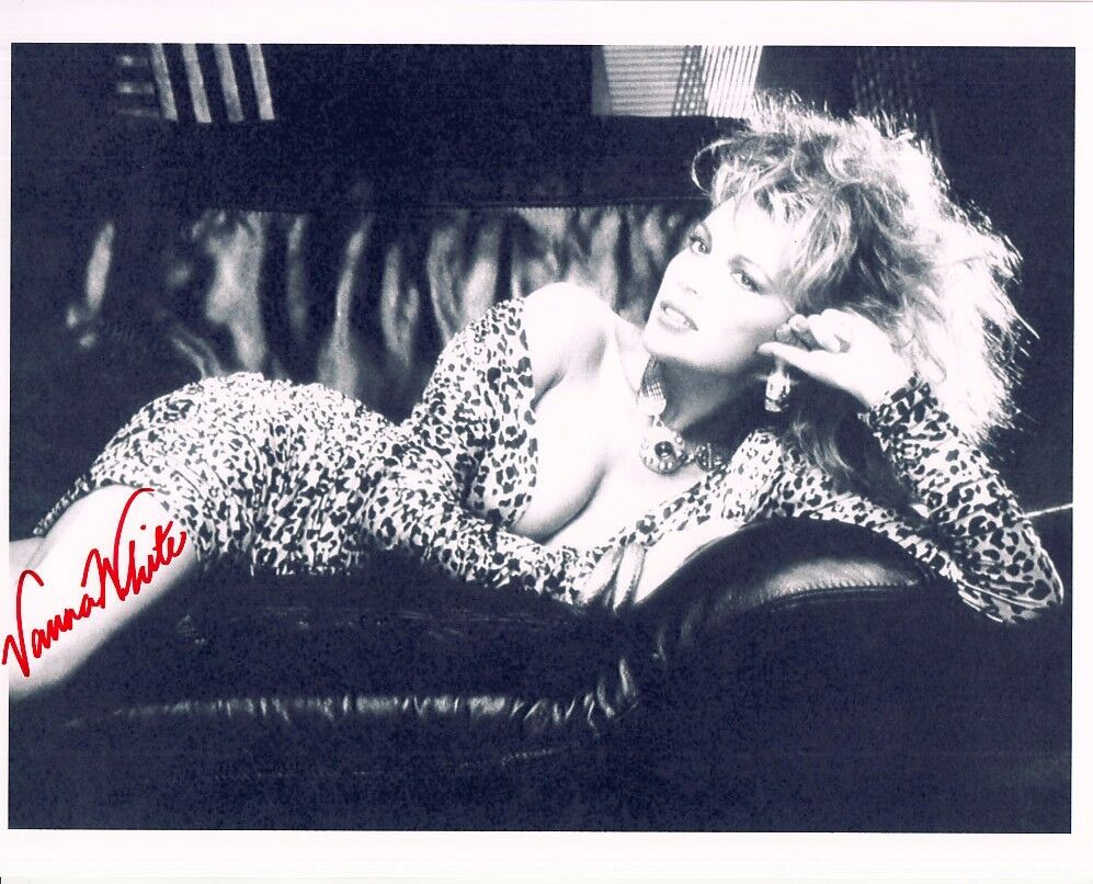 VANNA WHITE signed SEXY YOUNG 8x10 CLOSEUP w/ coa BUSTY LEGGY LYING ON SOFA