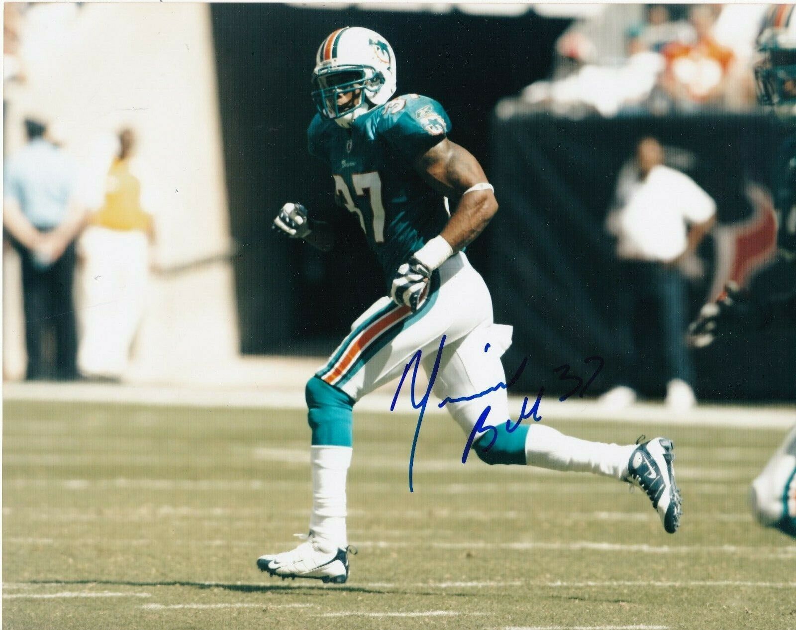 YEREMIAH BELL MIAMI DOLPHINS ACTION SIGNED 8x10