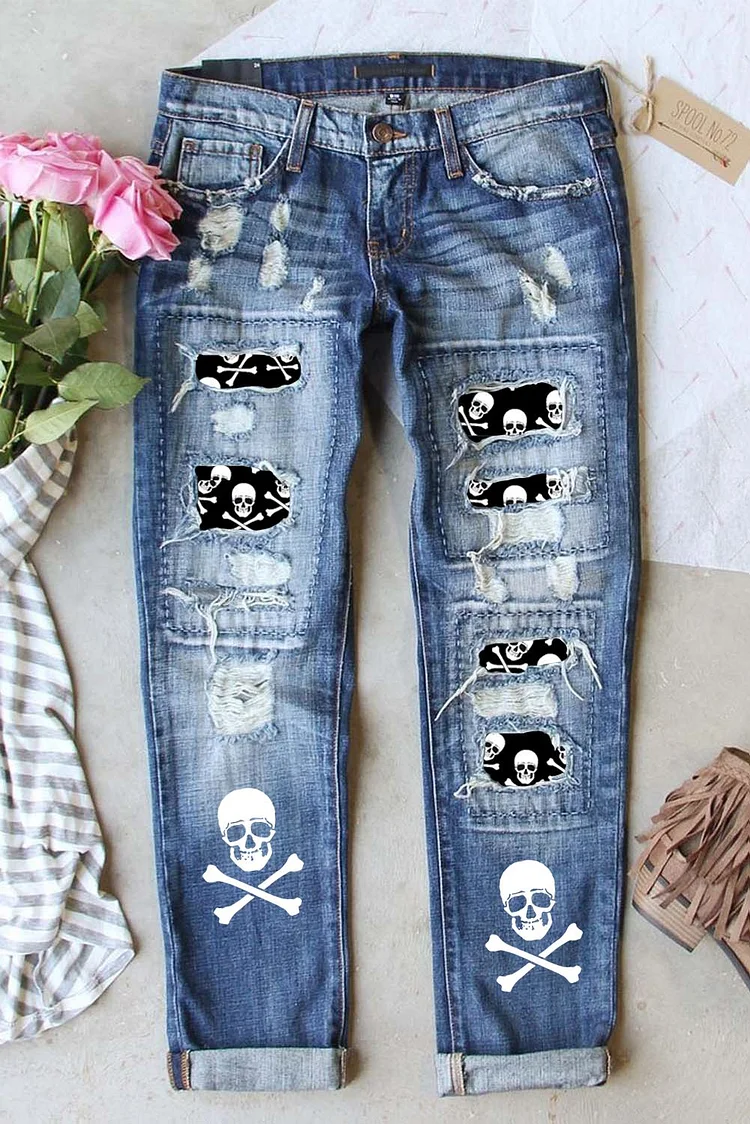 SKULL BUTTON POCKETS RIPPED JEANS