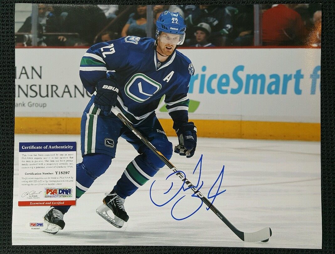 DANIEL SEDIN Autographed Vancouver Canucks 11x14 Photo Poster painting. PSA